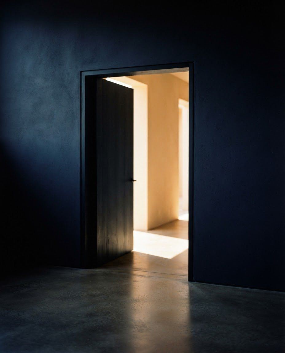 An open doorway with light spilling through